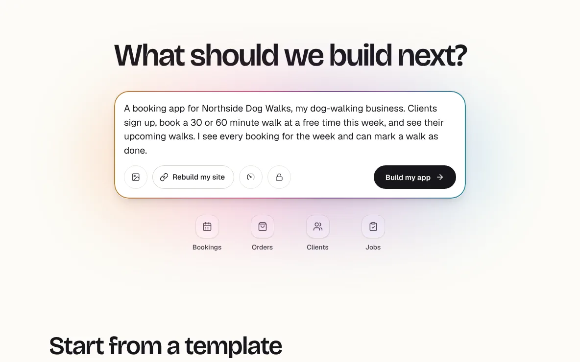 Fabricate's home screen, What should we build next?, with the booking app's three sentences typed in the box beside the Build my app button